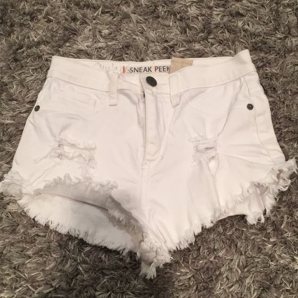 NEW CONDITION. White denim shorts